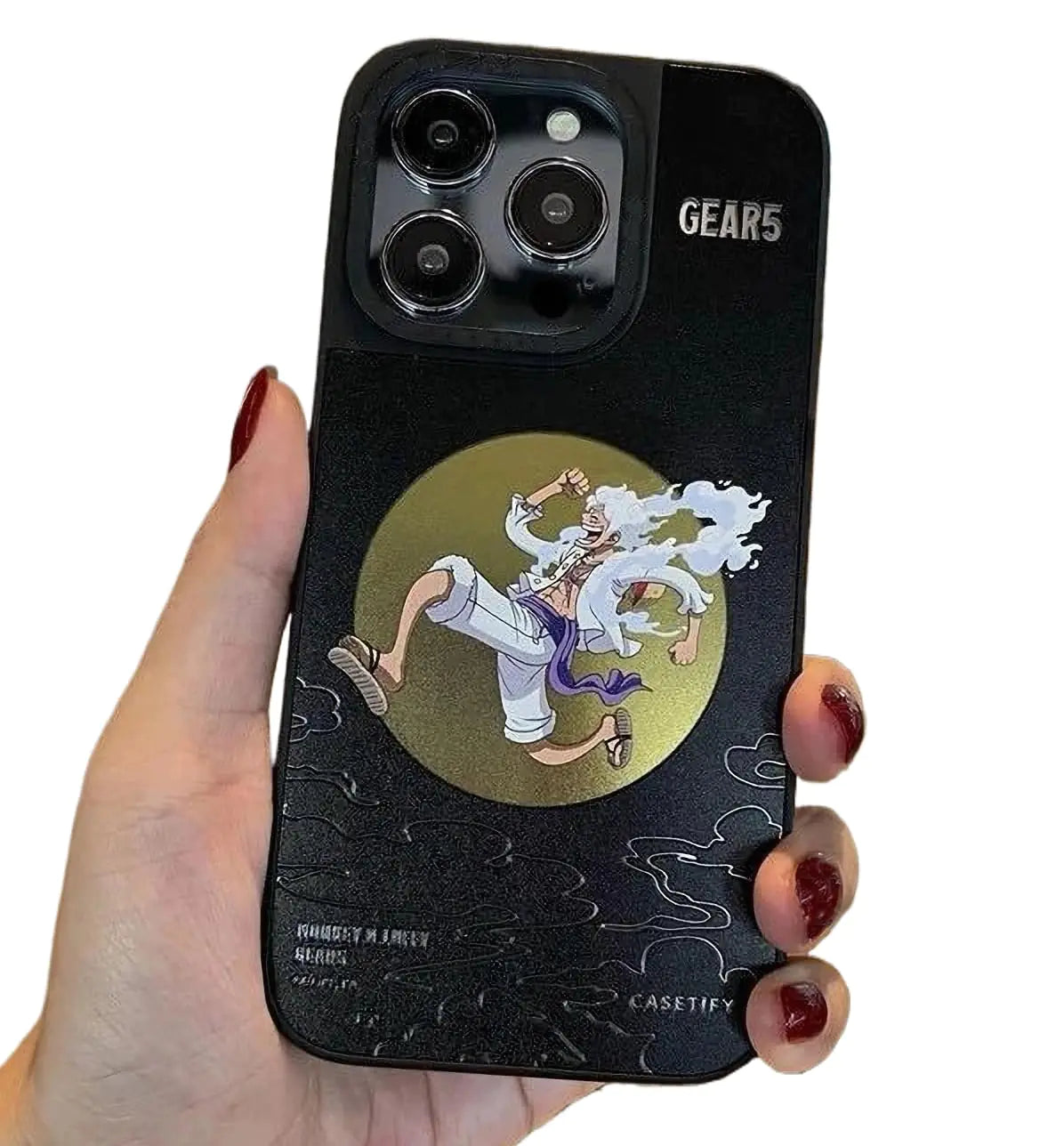 A hand holding a iPhone 13 or 14 case with a unique mirror design featuring red and black colors and various symbols and text.