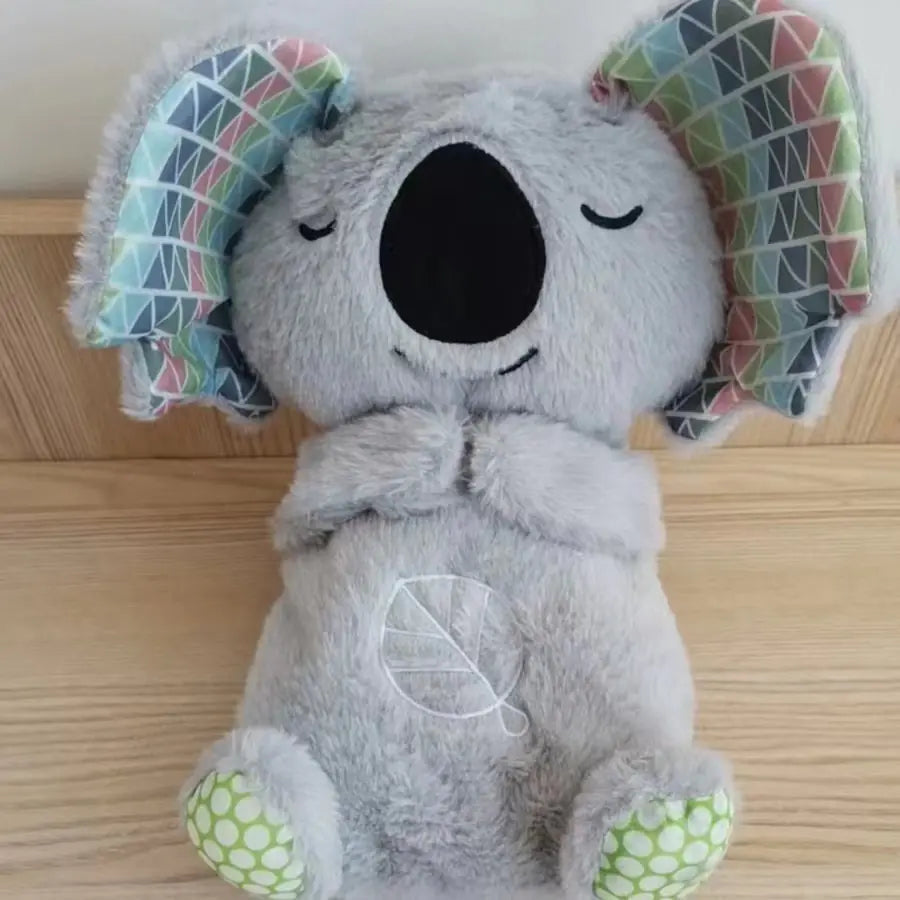 Otter de Pelúcia Musical Máquina de Som Soothe 'n Snuggle Portátil com Detalhes Sensoriais, Música, Luzes e Movimento de Respiração Rítmica WEM Support (www.WEM.support)