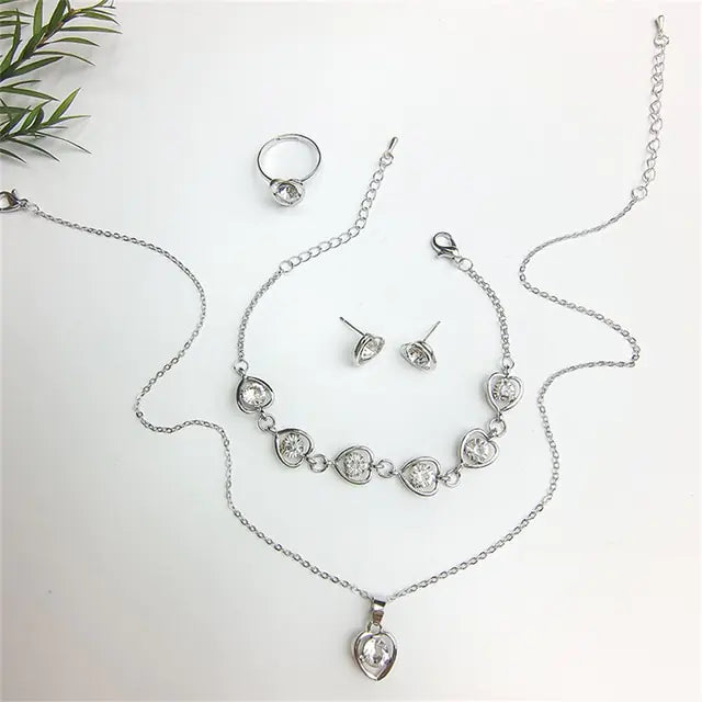 Luxury Cutout Heart Colored Zircon Stud Earring Bracelet Necklace WEM Support (www.WEM.support)