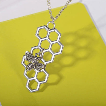 Vertical Honeycomb Pendant With Bee And Chain WEM Support (www.WEM.support)