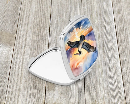 Pelican Fyling at Sunrise Compact Mirror WEM Support (www.WEM.support)