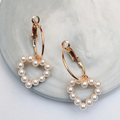 Kely Pearl Earrings WEM Support (www.WEM.support)