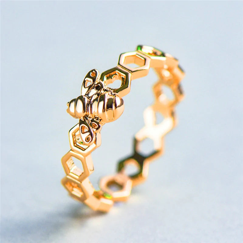 Gold and Rose Gold Colored Honeycomb Ring with Bee Accent WEM Support (www.WEM.support)