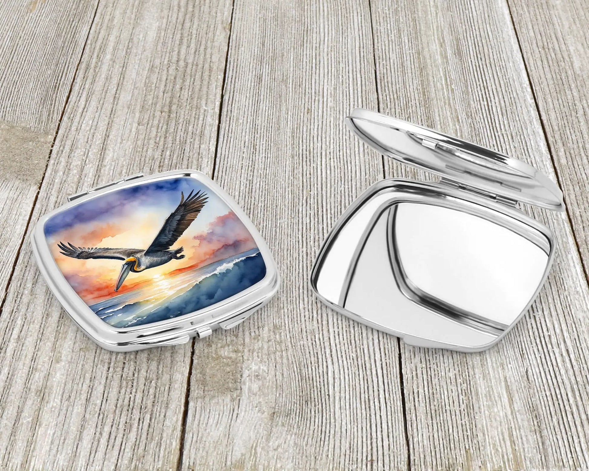 Pelican Fyling at Sunrise Compact Mirror WEM Support (www.WEM.support)